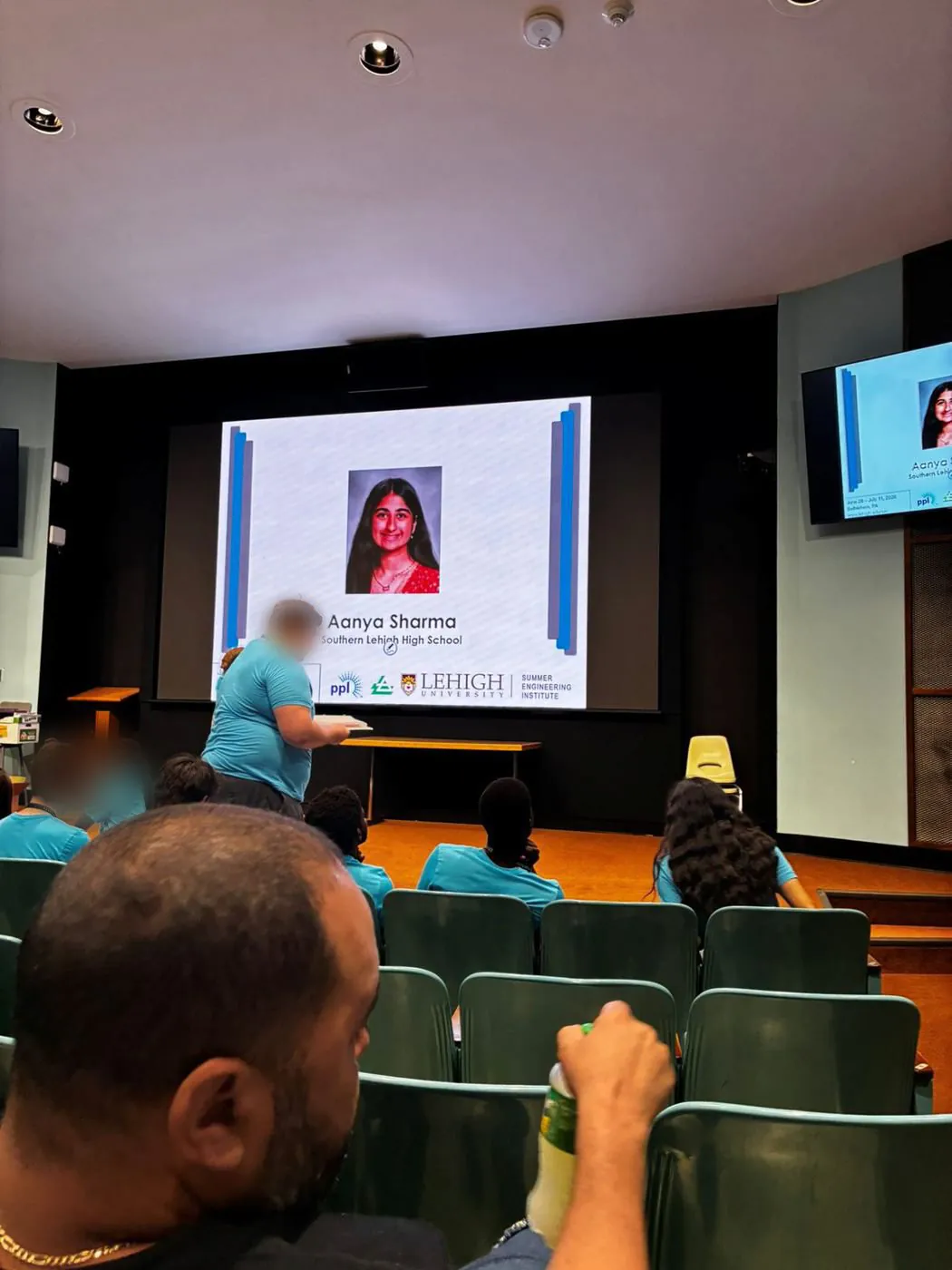 Aanya's photo displayed on screen during the Summer Engineering Institute program